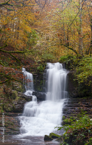 Fototapeta Naklejka Na Ścianę i Meble -  Irurrekaeta waterfall, Autumn in the Irurrekaeta waterfall, Arce valley, Navarre