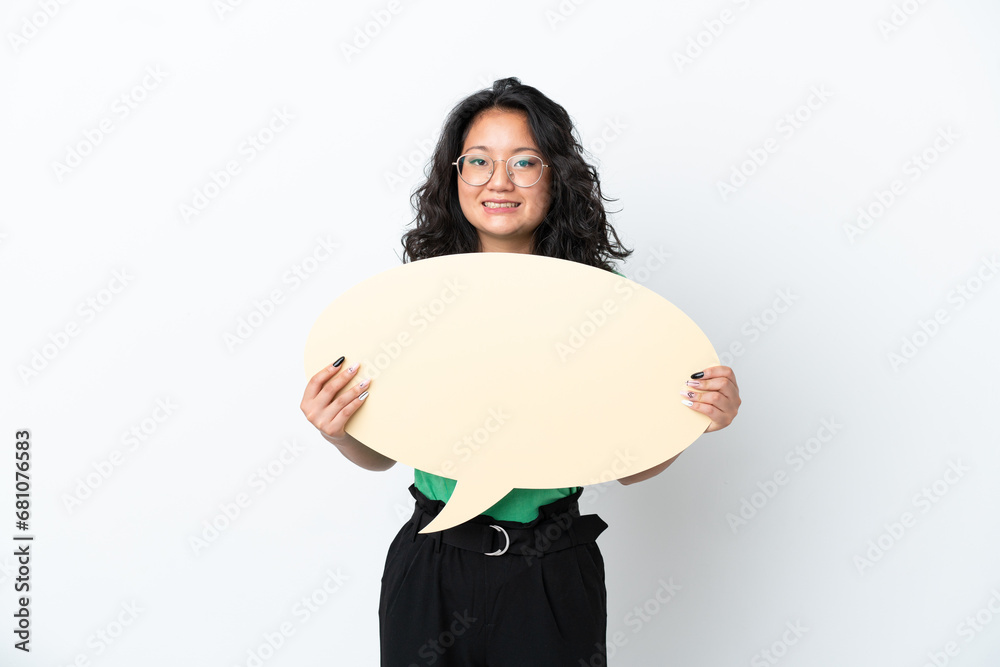 Young asian woman isolated on white background holding an empty speech bubble Young asian woman isolated on white background holding an empty speech bubble