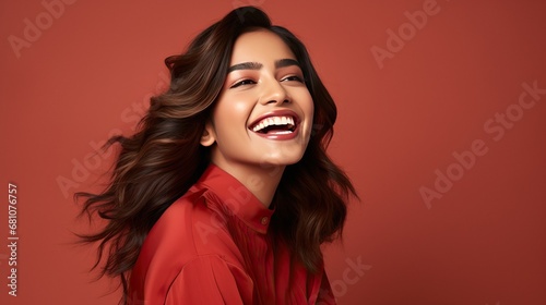 Radiant North Indian Model: Smiling Beauty, Red Lipstick, Flawless Makeup on Red Background generative ai 
