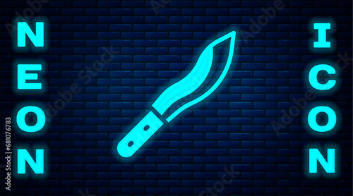 Glowing neon Machete or big knife icon isolated on brick wall background. Vector