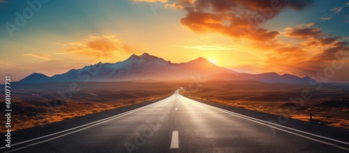 Scenic landscape with road and mountain silhouette at sunset Copy space image Place for adding text or design