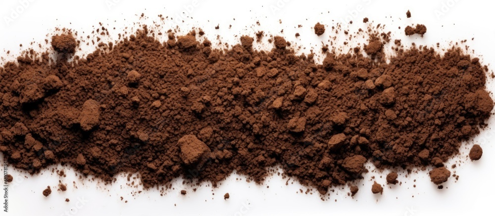 Scattered soil pile on white background top view Copy space image Place for adding text or design Scattered soil pile on white background top view Copy space image Place for adding text or design