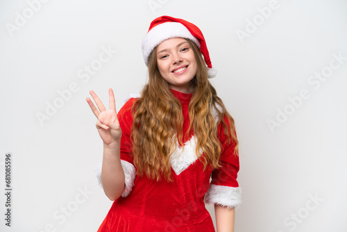 Young caucasian woman with Christmas dress isolated on white background happy and counting three with fingers