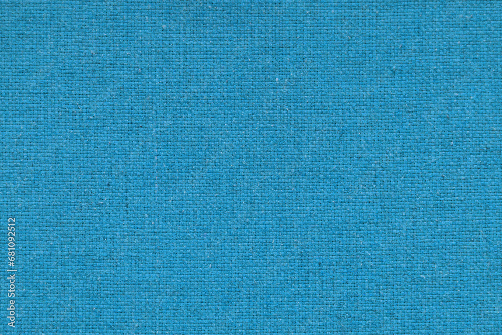 Blue burlap with beautiful canvas texture of blue fabric in retro style with beautiful blue fabric canvas texture as vintage burlap for background and design Blue burlap with beautiful canvas texture of blue fabric in retro style with beautiful blue fabric canvas texture as vintage burlap for background and design