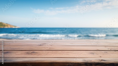 Close up wooden table with the sea in the background, sunny day, clear sky.