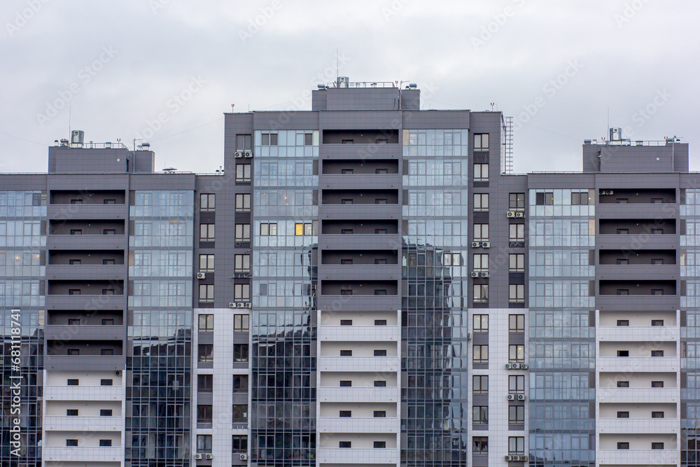 Fototapeta premium Modern multi storey apartment building elevation