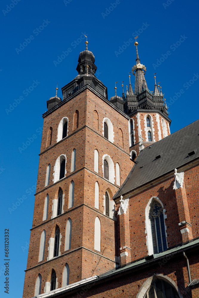St. Marys Basilica at the Main Square in the Old Town, Krakow, Poland. Detail of domes of Gothic Saint Mary Basilica. Traveling Europe
