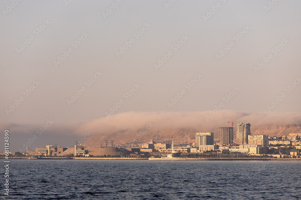 Baku. Azerbaijan. 05.17.2021. Primorsky boulevard in the morning mist. Baku. Azerbaijan. 05.17.2021. Primorsky boulevard in the morning mist.