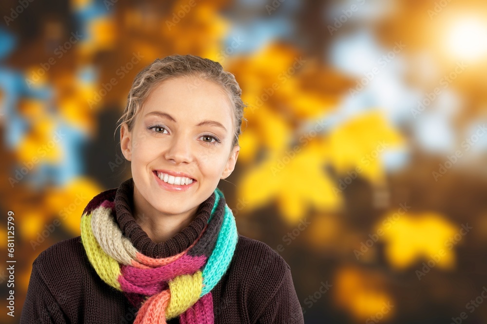 Young woman in autumn park with foliage leaves Young woman in autumn park with foliage leaves