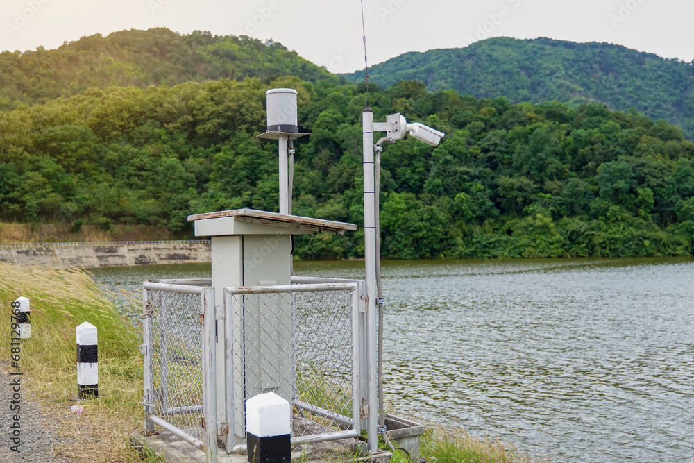 Solar automatic water metering station or water level meter used to measure the water level of a reservoir to help alert villagers to watch out for flooding if the flood level reaches the meter.