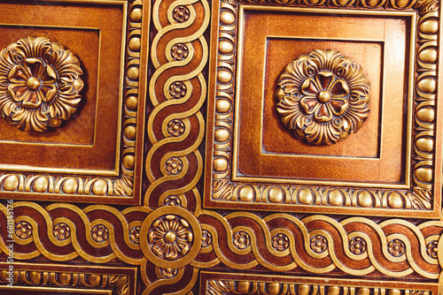 A Majestic Wooden Door with Intricate Carvings at Peles Castle