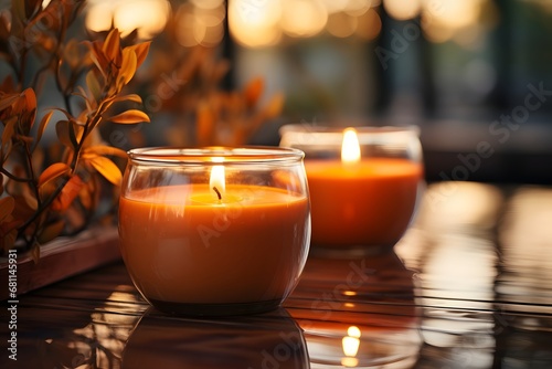 Burning candles on glass table in cafe, closeup. Space for textv