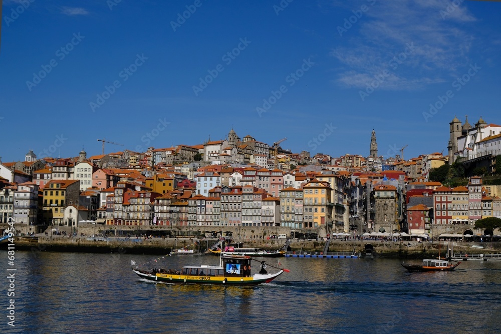 Panorama of Porto and tourist boat on Douro river, Portugal
