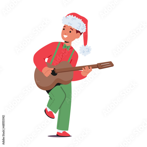 Child Boy In A Festive Christmas Costume Strums A Guitar With Joy. Happy Kid Character Spreading Holiday Cheer