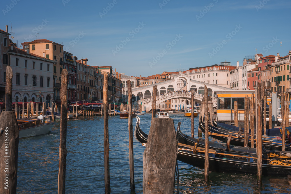 Scenic view of the Grand Canal in Venice, Italy, with moored gondolas. Iconic and tranquil, showcasing the beauty of the historic city and its famous waterways.