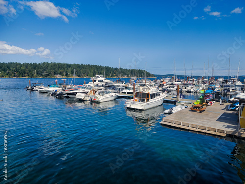 Boat launched at Mill Bay Marina during summer day © JoelBourgoin