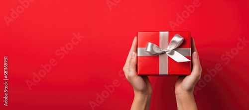 Hands Giving a Christmas or...