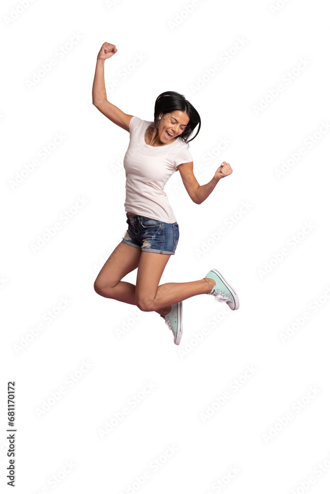 Full length portrait of a joyful young woman jumping and celebrating on transparent