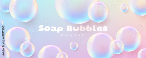 Realistic soap bubbles. Cute banner. Transparent bubbles with a glossy rainbow surface, conveying a clean and airy concept. Not AI generated.
