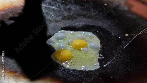 Delhi Delights the Street-Side Mastery in Crafting Perfect Half-Fry Eggs photo