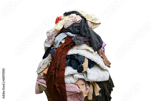 Sorting clothes after washing, isolated on white background. Filling the basket with adult and baby clothing