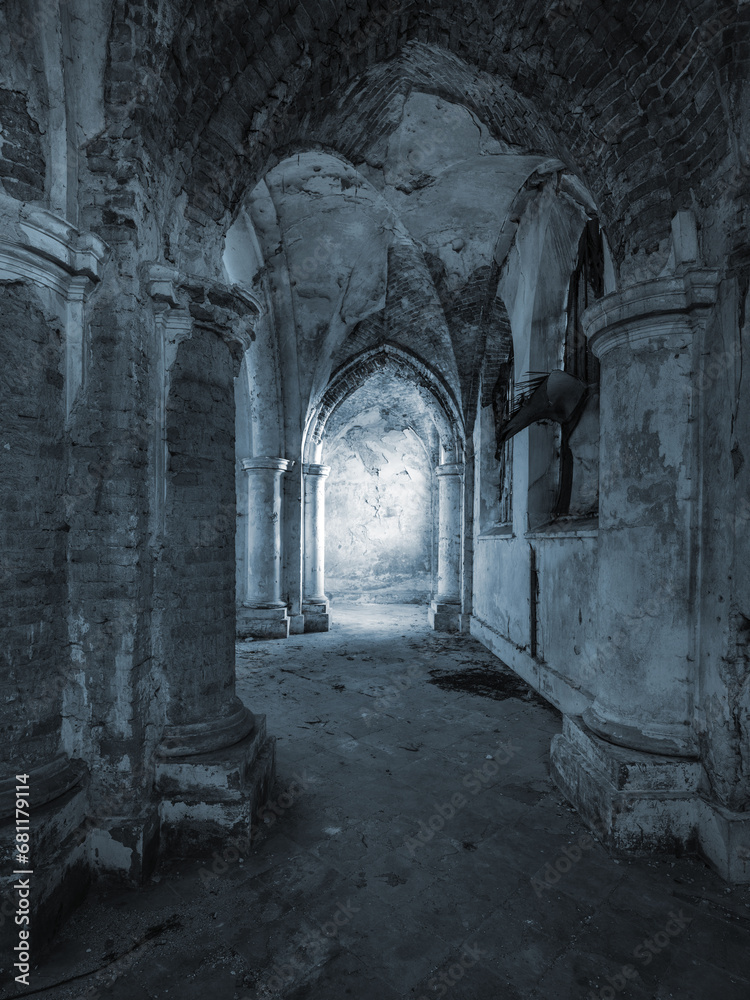 view to light on the wall through columns in abandoned cathedral in vintage style