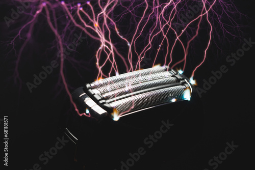 electric shaver head with electrical lightning strikes on razor photo