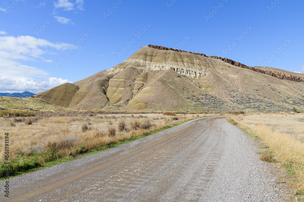 Gravel road within John Day Fossil Beds Painted Hills Unit National Monument