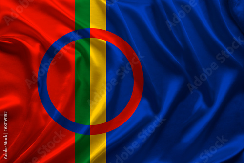 beautiful colored national flag of lapland on textured fabric, concept of tourism, emigration, economy and politics, closeup photo