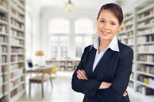 Confident professional business woman employee standing in office