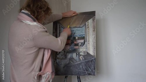 the artist tore his painting the artist is nervous photo