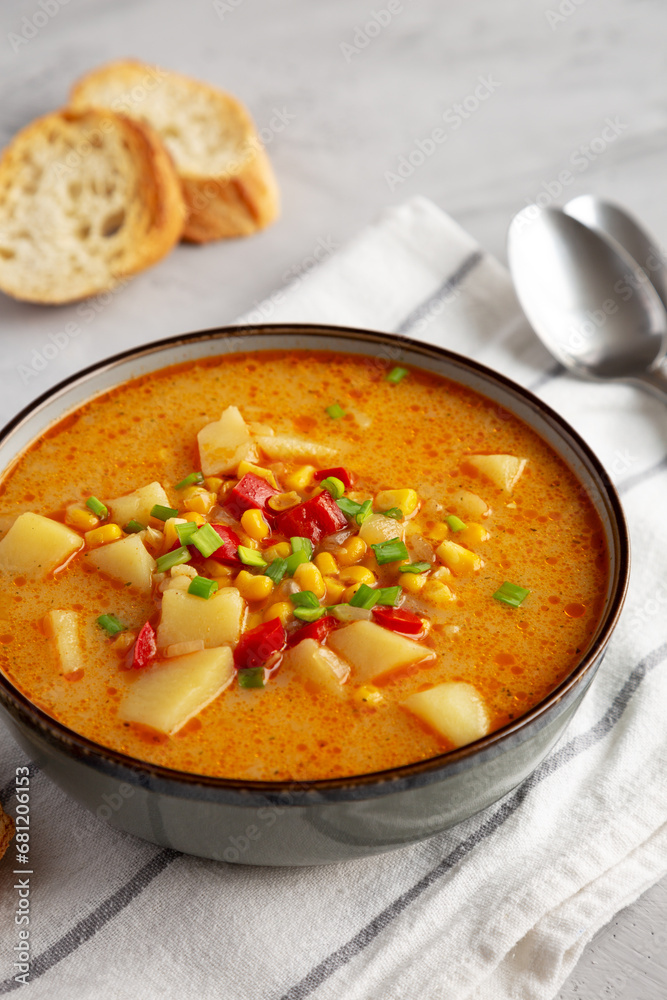 Homemade Corn Chowder in a Bowl, side view. Close-up. Homemade Corn Chowder in a Bowl, side view. Close-up.