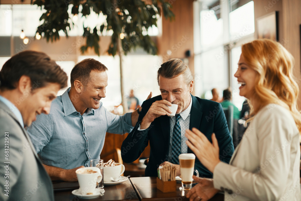 Group of professionals enjoying a coffee break together Group of professionals enjoying a coffee break together