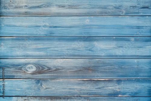A serene backdrop of horizontal blue wooden planks with a subtle whitewash finish, ideal for backgrounds or as a rustic element in creative projects. photo