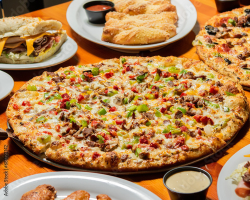 Cheesesteak Pizza with a Delicious Variety of Food Choices