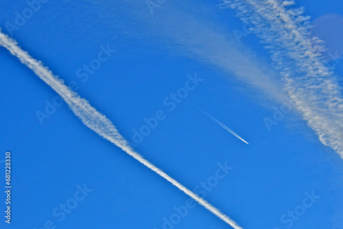 New contrail through three degrading contrails classified as short-lived, persistent non-spreading, and persistent spreading.