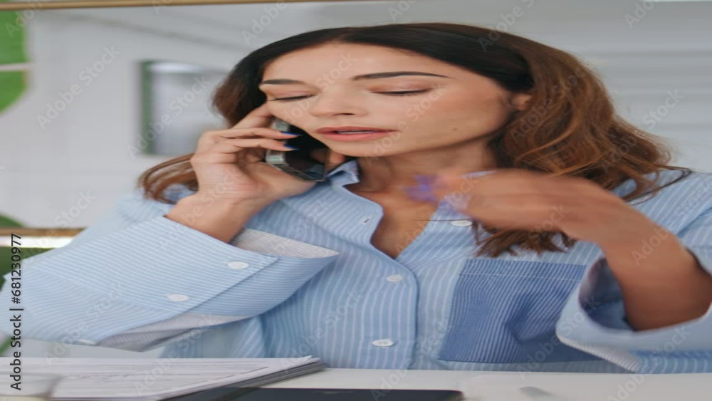 Stressed woman solving problem on call closeup. Serious executive talk vertical Stressed woman solving problem on call closeup. Serious executive talk vertical