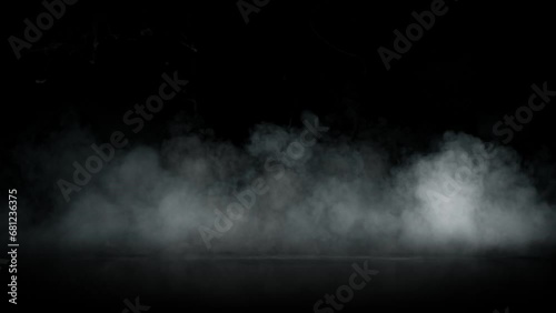 Super Slow Motion Shot of Atmospheric Smoke Slowly Floating on Black Background at 1000fps. photo