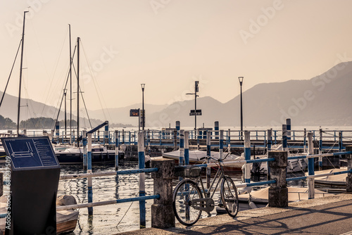 View of the pier in the town of Iseo, on Lake Iseo, Italy, in the late afternoon
