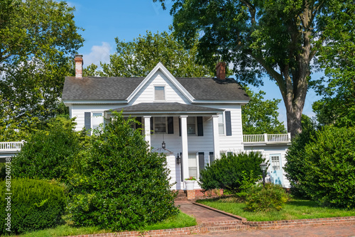 Traditional American House in Colonial Style. Beautiful old style American house with columns. © kosoff