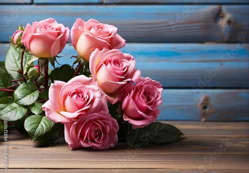 Flowers  pink roses on a wooden background