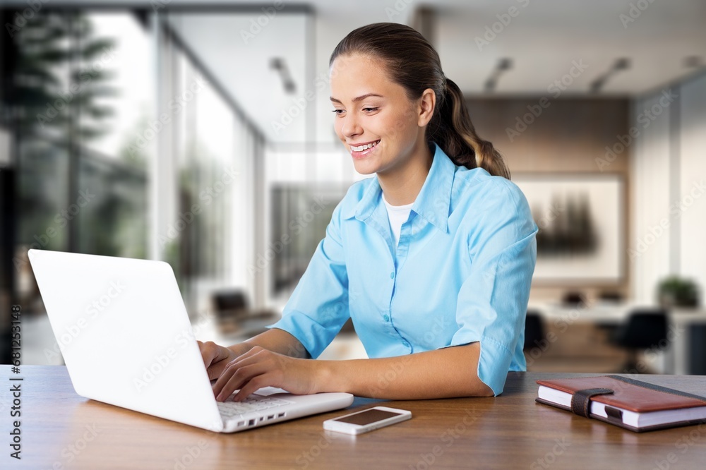 Portrait smile young woman in office Portrait smile young woman in office