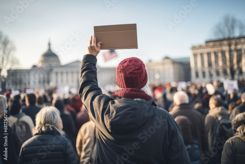 A person holding a protest sign against high taxes at a political rally. Concept of tax reform and activism. Generative Ai.