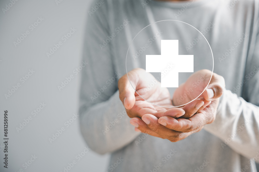 Depicts hand holding plus icon for medical care. Health insurance health concept with access to welfare health and room for text. Emphasizes value enhancement in healthcare. Depicts hand holding plus icon for medical care. Health insurance health concept with access to welfare health and room for text. Emphasizes value enhancement in healthcare.