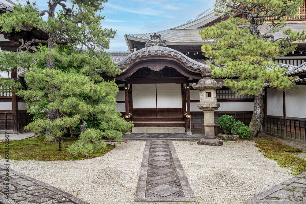Traditional Zen architecture in Japan.
Gravel entrance with ornamental trees.
Traditional Zen architecture in Japan.
Gravel entrance with ornamental trees.