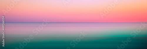 Romantic foggy motion blur sunset or sunrise landscape for soft warm-toned pastel seascape backgrounds photo