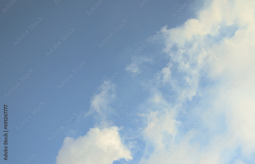The masses of white smoke released into the air from the pipes of an industrial plant The masses of white smoke released into the air from the pipes of an industrial plant
