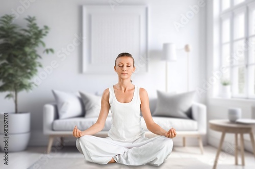 Young female meditating sitting at home Free Download Young female meditating sitting at home - GFXLoad