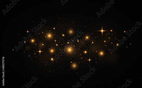 Golden sparks glitter special light effect on a transparent background.
