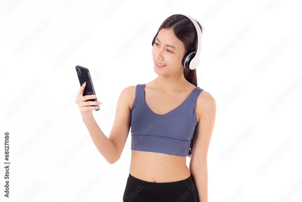 Portrait young asian woman in sportswear wearing headphone listening music with smart phone isolated white background, woman wearing headset listening audio for relax with smartphone, sport concept. Portrait young asian woman in sportswear wearing headphone listening music with smart phone isolated white background, woman wearing headset listening audio for relax with smartphone, sport concept.